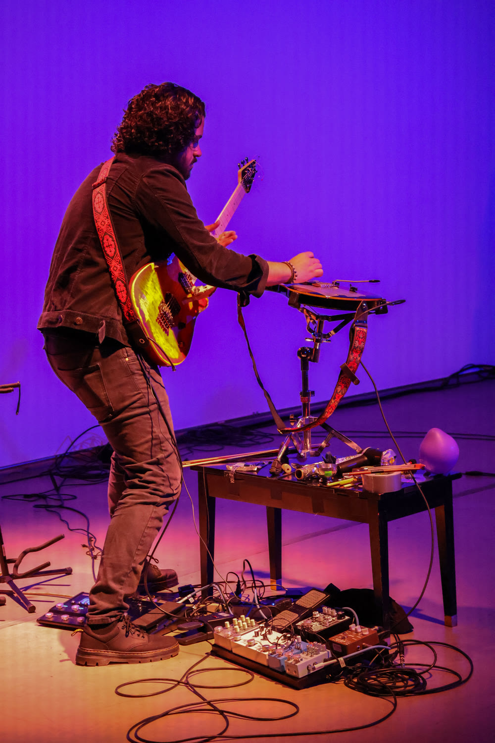 Danniel Ribeiro performing on prepared electric guitar